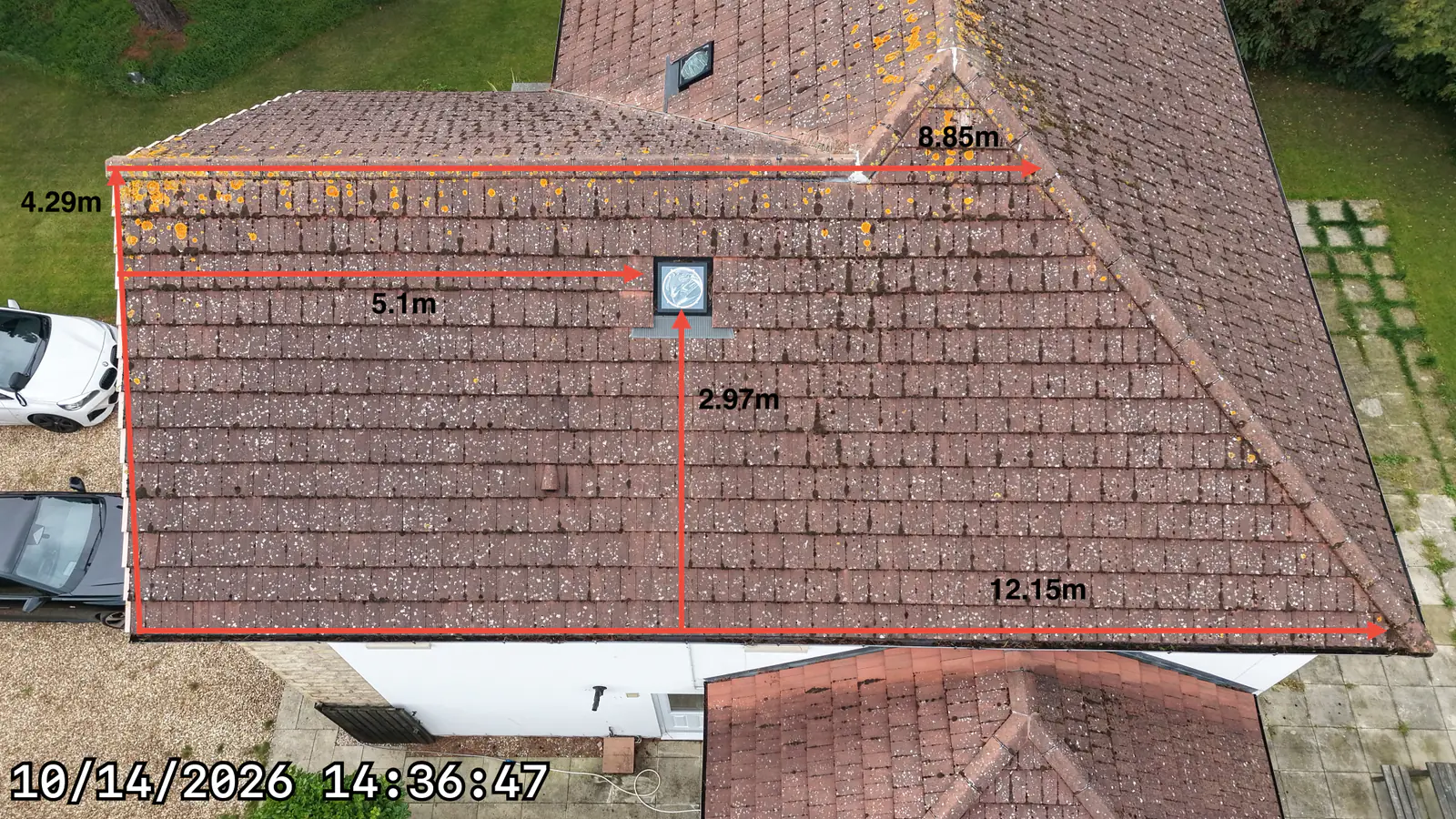 Actual solar survey photograph with measured east-facing roof edges and rooflight offsets