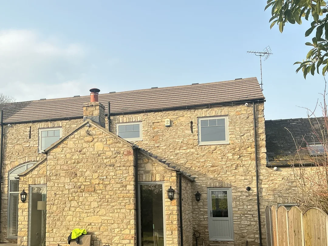 Rear elevation of a stone-built home from a completed Vertex survey near Knottingley